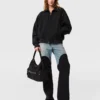 Denim-Jeans mit Patchwork-Einsätzen