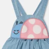 Denim-Strampler mit Marienkäfer-Stickerei