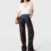 Jeans mit Schlangenpanel