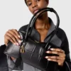 Ryder Schultertasche mit Krokodilprägung