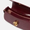 S-Wave Schultertasche mit Krokodilprägung