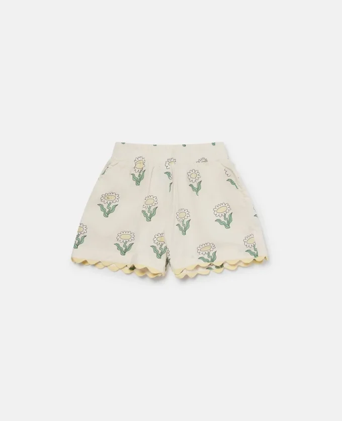 Shorts mit elastischem Bund und Wellenkante mit Gänseblümchen