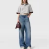 Verwaschene High-Waist-Jeans mit weitem Bein